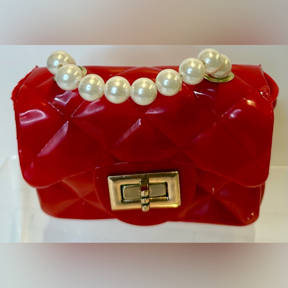 Elegant Red Quilted Handbag with Pearl Accent